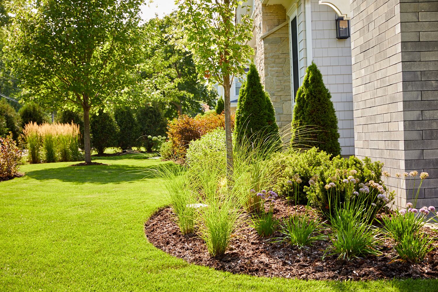 Mulch installation in landscape beds — Green Grass Landscape, Chicago's western suburbs