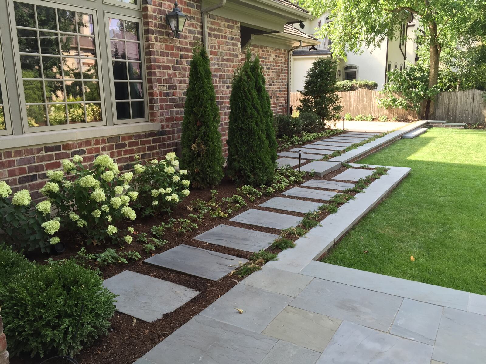 Mulch installation in landscape beds — Green Grass Landscape, Chicago's western suburbs